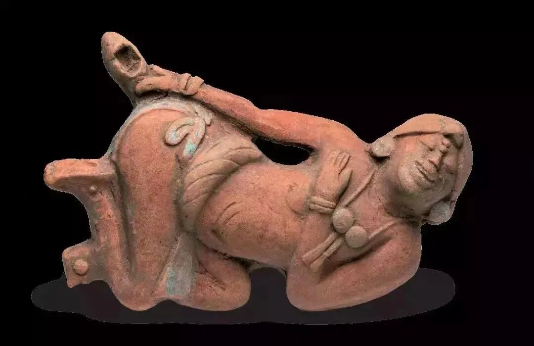 Figure 10. An enema scene among the ancient Maya.